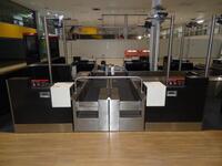 A pair of check in desks with Avery Weigh-Tronix scales