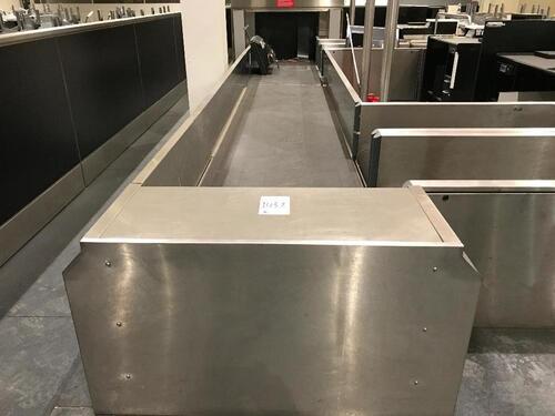 Double baggage belt for check-in desk island of four desks. Total length 7,500mm. Collection belt L 4850mm. Feeder belt L 2,600mm.