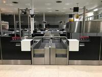 A pair of check in desks with Avery Weigh-Tronix scales