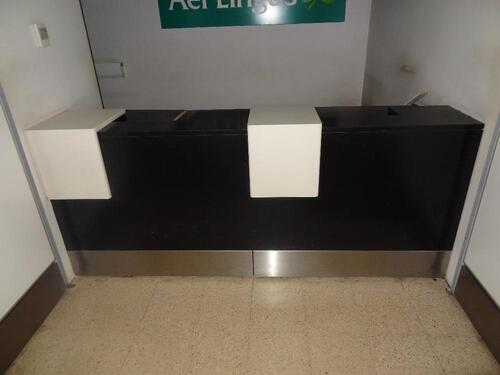 Airline desks (information) 2-modules, rear storage space, consisting of shelves and cupboard, under counter seating space. Each module D 900mm, W 1200mm, H 950mm