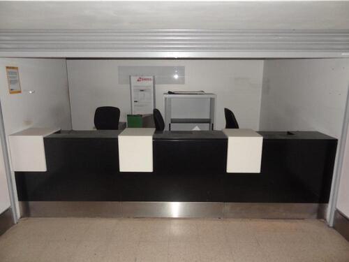 Airline desks (information) -modules, rear storage space, consisting of shelves and cupboard, under counter seating space. Each module. D 900mm, W 1200mm, H 950mm