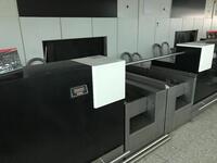 A pair of check in desks with Avery Berkel L108 scales