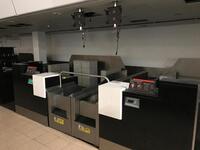 A pair of check in desks with Avery Weigh-Tronix scales