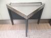 Stainless steel topped "security search table"" triangler in shape, with top bar and grey metal legs (adjustable) and a perforated grey metal back. W 1090mm H 850mm D 570mm<br />
