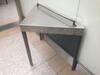 Stainless steel topped "security search table"" triangler in shape, with top bar and grey metal legs (adjustable) and a perforated grey metal back. W 1090mm H 850mm D 570mm<br /> - 2
