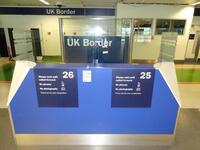 Dual security check desk ,4 glass panel partition, with single glass divider, double shelf ,Dimensions H1200mm W2400mm D900mm.