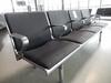 (31) Four person seat, cast alloy construction. Black leather style seat and backs, chromed feet and five chromed armrests L 2200mm D 600mm H 800mm - 3