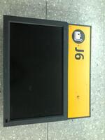 Check-in display and sign with baggage weigh scale symbol