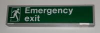 Wall mounted emergency exit illuminated sign. Metal box construction.