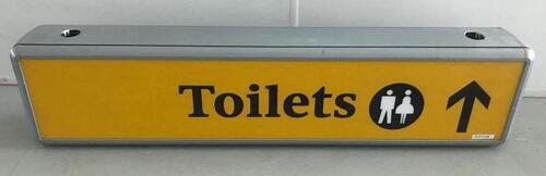 Illuminated sign 'Toilets', curved metal construction.