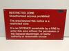 Metal Restricted Zone Sign