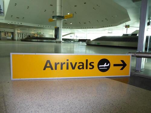 "Arrivals" sign with aluminium frame