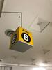 Zone B' ceiling mounted illuminated location sign