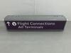 Flight connections Illuminated sign, curved metal construction. H 300mm W 1250mm D 130mm