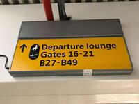 Illuminated 'Departure Lounge and Gates' sign