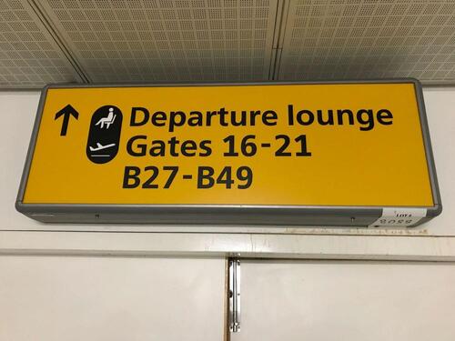 Illuminated 'Departure lounge and Gates' sign