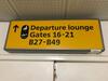 Illuminated 'Departure lounge and Gates' sign