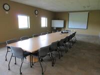 216" X 60" CONFRENCE TABLE W/ (16) SIT ON IT CHAIRS, (1) SANYO PROJECTOR, (1) BREADFORD 8" PROJECTOR SCREEN, (1) PANASONIC PANABOARD AND (2) QUARTZ CL