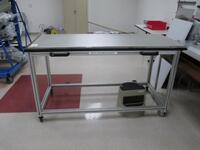 Metal Work Table 63" x 37" x 29"D.s/n Tag #N/A Category: Lab Location: R&amp;D