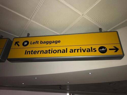 Heathrow International Arrivals illuminated sign