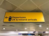 Departures and UK & Ireland arrivals sign