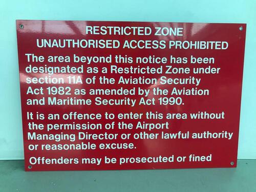 Restricted Zone metal sign