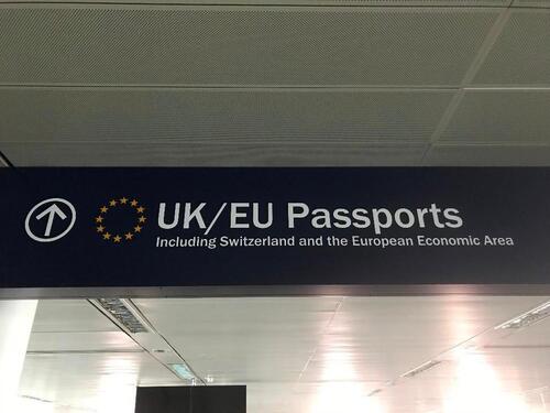 'EU/UK passports' sign, metal construction