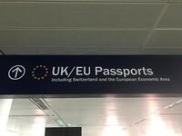 'EU/UK passports' sign, metal construction