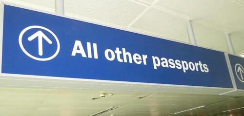 Illuminated light box 'All other passports' sign,