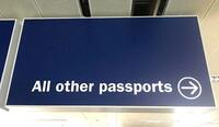 Illuminated light box 'All other passports' sign,