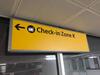 Check -in Zone K ceiling suspended large sign in metal frame