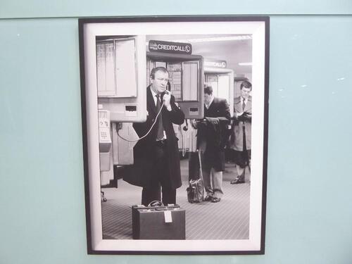 Iconic black & white photo of 'Credit Call' telephone booth in Heathrow