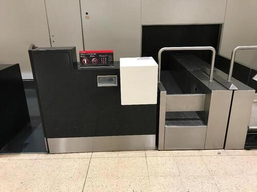 Heathrow Check-in desk with scale and conveyor