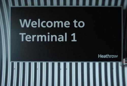 Wall mounted 'Welcome to Terminal 1' sign