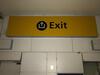 ‘Exit’ illuminated sign, Large international arrivals