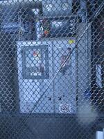 SDC CiphercoN 1500 Automated Hazardous Gas Two Cylinder Cabinet. Location: Outside Cage South