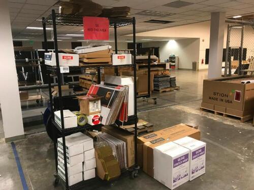 Shipping Supplies Including rolling rack Location: