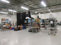 LOT ASST'D STUDIO EQUIPMENT, STORAGE BAGS, CLAMPS, STANDS, EXTENSION CORDS, WITH (9) WIRE RACKS ON CASTERS