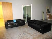 LOT (2) BLACK SOFAS, 70" X 34" X 26", (1) 3 SIDED MIRROR WITH WOOD FRAME