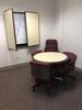 Reception Area Furniture to Include: 71" x 76" Reception Cube with chair, 108" Desk Return, two (2) Waiting Chairs, Table, Small Conference Table, four (4) Chairs and Enclosed White Board. Sale is subject to seller confirmation. Location: Administrative A - 5