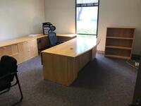 Executive Office Suite to Include 84" Desk with Chair, File Cabinets, L-Shaped Desk Return, Book Shelf, Small Conference Table, Three Chairs, also includes three (3) offices of assistant office furniture. Sale is subject to seller confirmation. Location: 