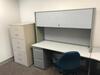 L-Shaped Desk with two (2) chairs and two (2) file cabinets. Sale is subject to seller confirmation. Location: Administrative Area - 3