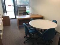 72" Desk with chair, Book Shelf, Credenza, Round Conference Table with four (4) chairs includes Whiteboard. Sale is subject to seller confirmation. Location: Administrative Area