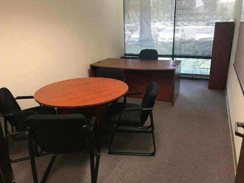 71" Desk with chair, Book Shelf, three (3) File Cabinets, Round Conference Table with four (4) chairs includes Whiteboard. Sale is subject to seller confirmation. Location: Administrative Area