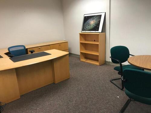 72" Desk with chair, U-Shaped 126" Desk Return, Book Shelf, Round Conference Table with three (3) chairs and Whiteboard . Sale is subject to seller confirmation. Location: Administrative Area