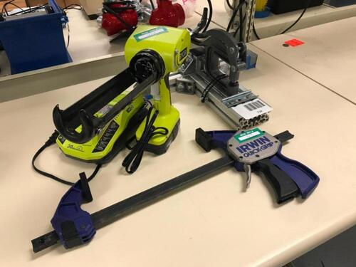 Ryobi P310G Power Caulk and Adhesive Gun with Punch and Irwin Clamp Location: Warehouse Area
