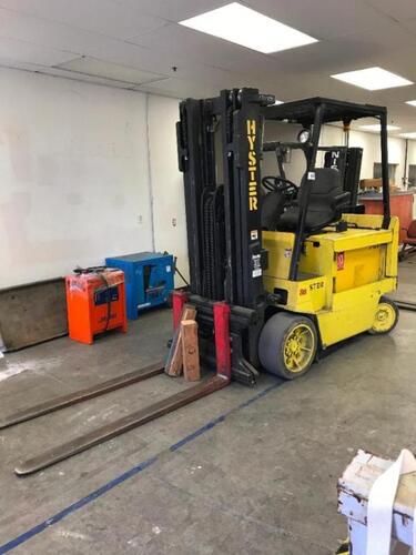 Hyster E80XL3 Fork Lift Truck, 7300 lbs. capacity, Electric with Side Shift, 65" Forks, 3-Stage Mast, 194" Maximum Reach, Solid Tires, Hours Unavailable, NOTE: NOT WORKING, Reported to need new battery, includes Yuasa Sealed Battery Charger C098N01840Z Lo