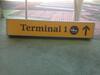 Flight connections / TERMINAL 1 sign