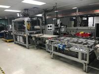 Frame Assembly System with Graco PR70V Variable-Ratio Metering System with two (2) Graco Check Mate C61 Liquid Dispensing Systems, FANUC Robotics LR Mate 200iC/5L Robot Arm and three (3) conveyors Tag Number Location: Pilot Line