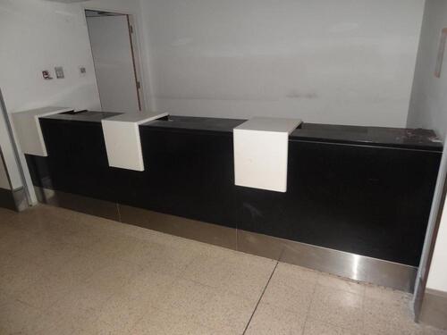 Airline desks (information) 3-modules, rear storage space, consisting of shelves and cupboard, under counter seating space. Each module. D 900mm, W 1200mm, H 950mm